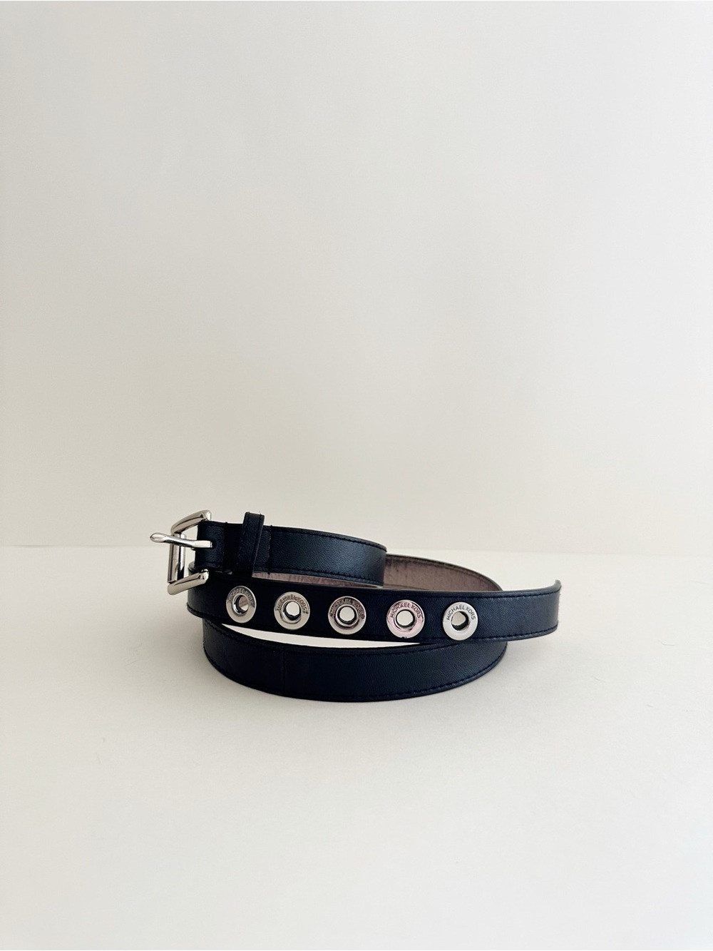 Michael Kors black leather Silver Eyelet belt